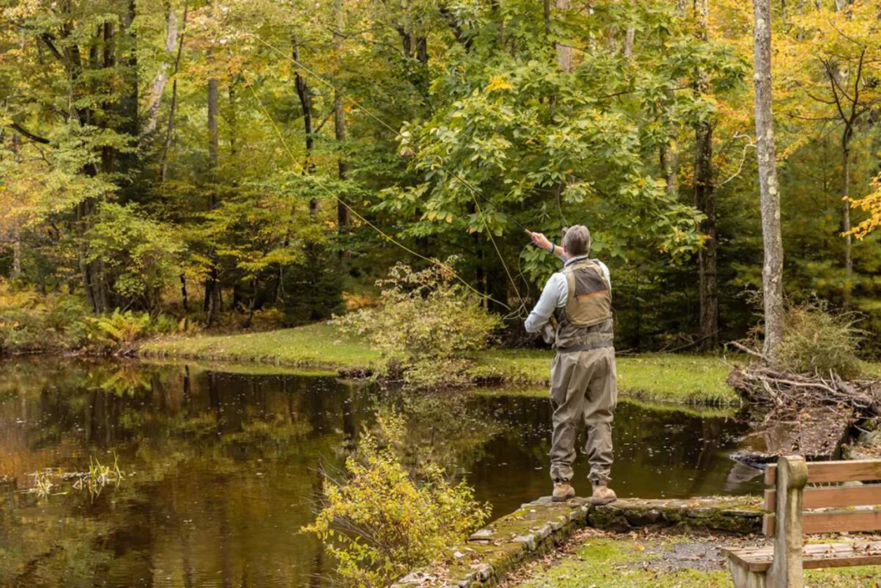 Man fly fishing at Skytop Lodge resort in the Poconos